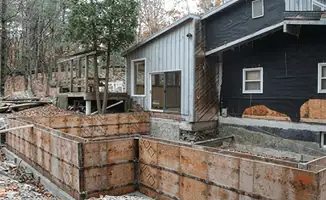 Prepared site with foundation forms for home remodeling and addition project in Overland Park, KS
