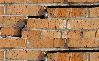 Brick wall with serious structural damage in Overland Park, KS